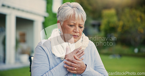 Image of Heart attack, pain and senior woman in a garden with hands on chest, anxiety or breathing problem. Cardiac arrest, stress and old lady outdoor retirement home with asthma, heartburn or lung disease