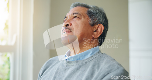 Image of Thinking, nostalgia and senior man at a nursing home window with memory, moment or relax. Remember, face and elderly male person in a living room with reflection, calm or chilling in retirement