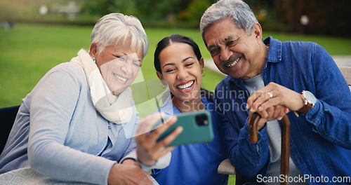 Image of Happy woman, doctor and senior people in selfie for photography, elderly care or retirement in nature. Medical nurse or caregiver smile with mature couple for picture, photograph or memory at park