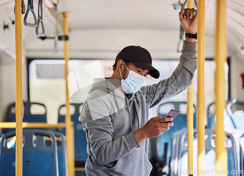 Image of Bus travel, smartphone and man with a mask, safety protection and typing with social media. Person, traveller and guy with face cover, covid regulations or cellphone with public transportation or app