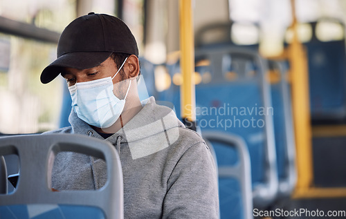Image of Man in bus with mask, checking phone and morning travel to city, reading service schedule or social media. Public transport safety in covid, urban commute and person in sitting with smartphone app.