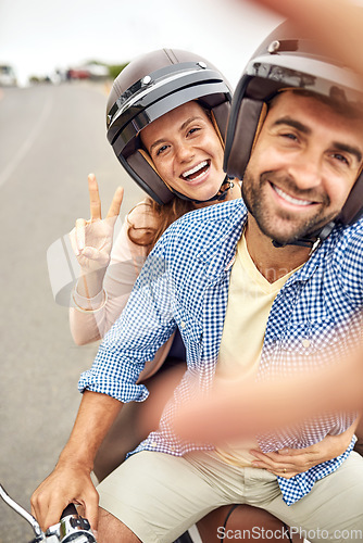 Image of Couple, peace sign and smile in selfie, hand and road trip or vacation, scooter and embrace in portrait. Happy people, freedom and emoji or icon in outdoors, travel and face or tourism with helmet