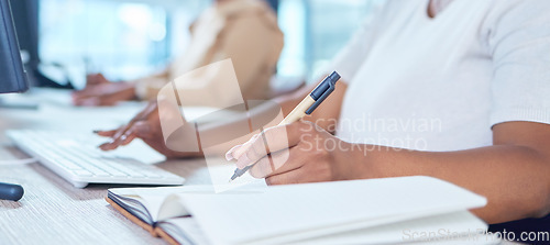 Image of Writing, typing and working on a office notebook and doing web research online on a computer. Hands of database administrator man worker planning a ux tech job strategy or erp innovation growth