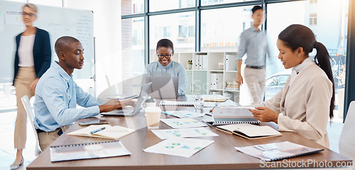 Image of Teamwork, planning and finance with a team of business people meeting in the office in a busy boardroom. Collaboration, strategy and development with a group at work on the company vision and mission