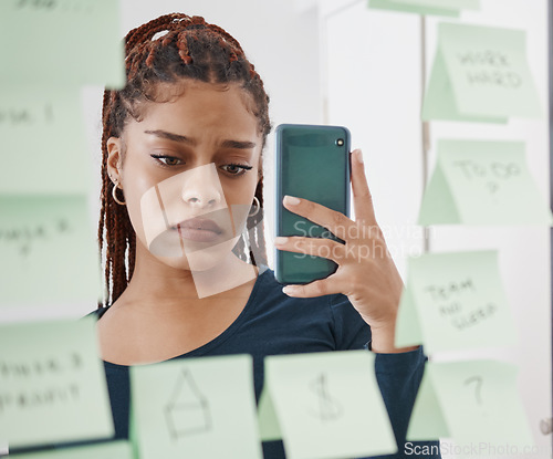 Image of Depression, phone and sad social media influencer recording her moodboard on a mirror reflection at home. Mental health, content creator and depressed girl with anxiety feeling stressed and alone