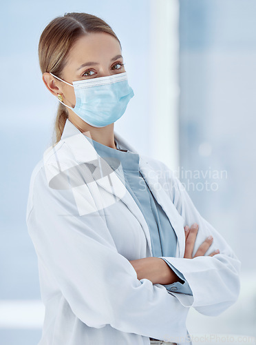 Image of Covid, face mask or woman doctor in hospital compliance for healthcare, medicine innovation or medical motivation to stop virus. Portrait, trust or insurance support worker in global disease research