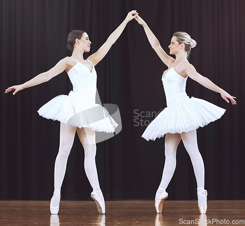 Image of Ballet women, stage and dance performance for creative show, recital or competition in classical ballet theater. Beauty, dancer partnership and prima ballerina team work together on abstract dancing