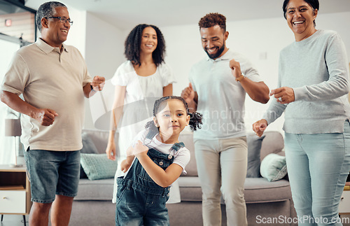 Image of Happy, family and dancing in playful living room fun together with entertainment in happiness at home. Group of people in relationship bonding, smiling and joyful funny dance at the house