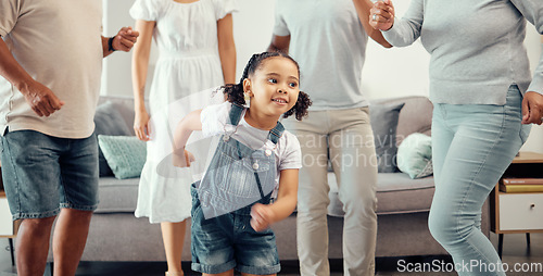 Image of Happy girl with family dancing in living room while playing, having fun and enjoy bonding quality time together. Happy family love, connection and freedom for youth child or kid at home dance party