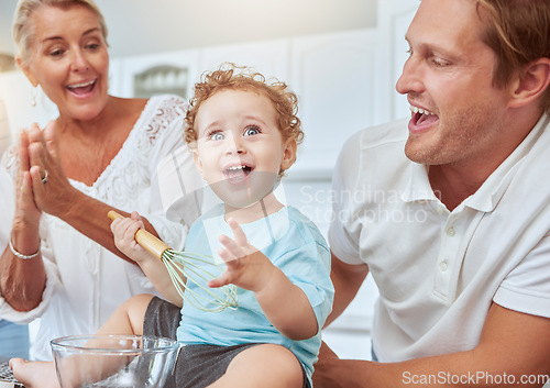 Image of Mother, father and baby baking as a happy family in a kitchen enjoys quality time and the weekend together. Development, learning and mom cheering for her young child with dad and ready to bake cake