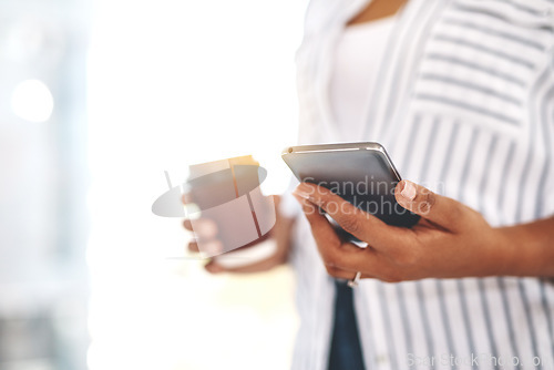 Image of Closeup of professional business woman on her phone working and replying to messages, emails or social media with flare. Black female businessperson holding work and personal cellphone in her office