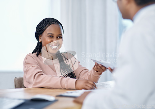 Image of Patient receiving medical script, prescription and sick note from a doctor during a consult, checkup and visit in a hospital or clinic. Smiling woman happy with good healthcare service and treatment