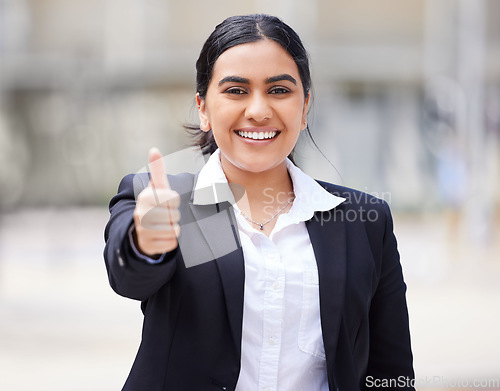 Image of Thumbs up, success and business intern feeling happy, proud and excited about job opportunity or goal. Portrait of entrepreneur feeling like winner, saying thank you and sharing motivation outside