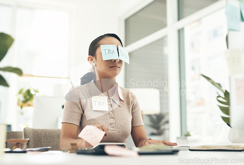 Image of Tax, audit and finance business woman sleeping, taking nap and working at a desk in an office at work. Tired, corporate and accounting employee looking stressed and dealing with financial problem