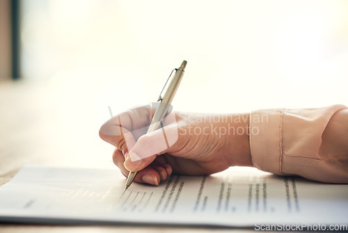 Image of Contract, document and paper work closeup of businesswoman signing, writing or filling out personal information, insurance or job form. Professional reading recruitment paperwork at a hiring company