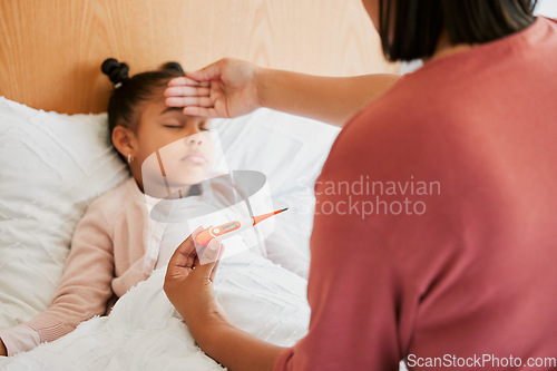 Image of Covid, care and sick little girl in bed with concerned mother checking temperature with a thermometer. Caring parent worried about her child with a fever, suffering from a cold, flu and covid fatigue