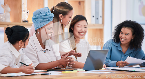 Image of Multicultural females only talking and planning business strategy and growth together in a meeting at the office. A happy marketing team of women collaborating on a project and working on a proposal