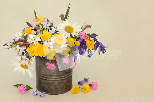 Image of English Wildflower and Meadow Grasses Arrangement in Old Metal T