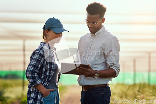 Image of Farmers with a tablet checking growth, monitoring farming progress and farm export orders on technology. Smiling gardener meeting with environmental scientist and analyzing data on agriculture estate