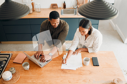 Image of Couple calculating budget, finance and tax while planning investment, loan and bills at home from above. Managing household spending, saving and account to pay money with online banking for insurance