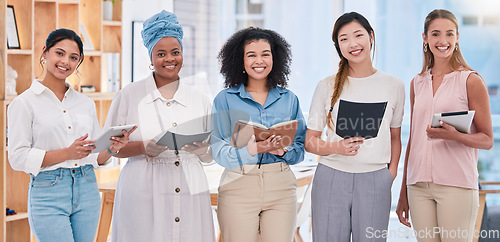 Image of Team of female digital marketing or social media planners working in a creative agency for online seo or website design. Portrait of empowering women in diverse workplace with good ideas and strategy