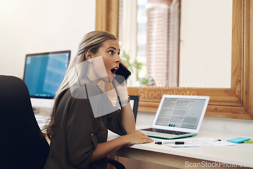 Image of Surprised, shocked and excited young businesswoman gossiping and listening to fake news on a phone call in the office. Amazed female gasping wow in disbelief with an oh my god expression on her face