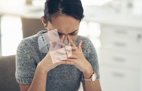 Image of Work stress, bad anxiety and job worry of a stressed female office worker with a headache. Business woman worried, tired and upset about a finance deadline with a migraine at the workplace