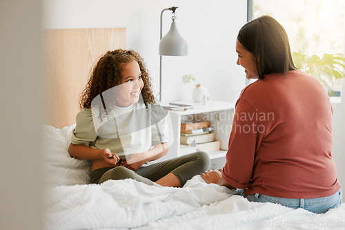 Image of Caring mother teaching child to take insulin injection by herself looking happy, proud and brave at home. Little girl injecting self with blood sugar measuring device to test for chronic illness