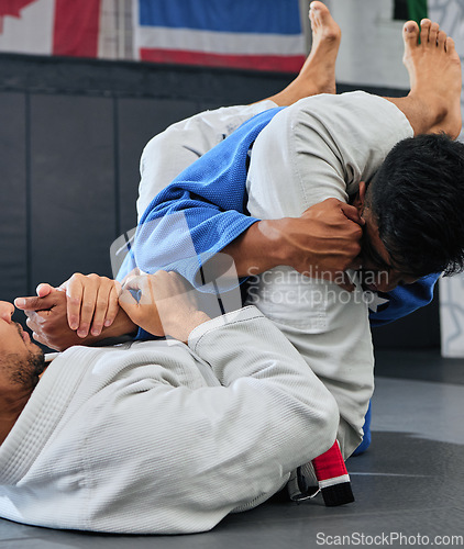 Image of Fight, karate and martial arts teamwork in competition, challenge or combat sport in wellness studio. Sports trainer or fitness coach teaching student in gym workout, exercise and training for health