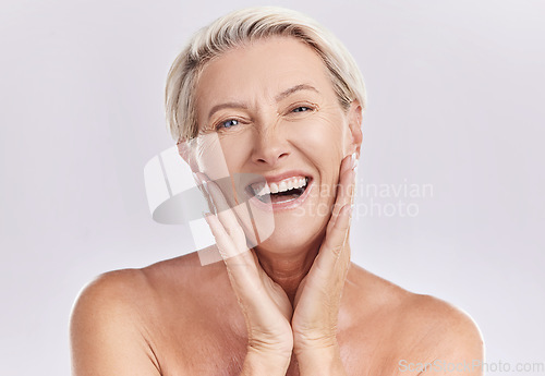 Image of Botox, menopause and anti aging woman in beauty, skincare or face wash portrait in a studio. Plastic surgery, dermatology or cosmetics senior model with a smile touching her natural looking skin