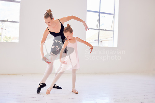 Image of Ballet, elegance and dancing instructor teaching a little ballerina movement and posture at a dance studio. Teacher bonding with a child while learning performance routine and grace, classical art