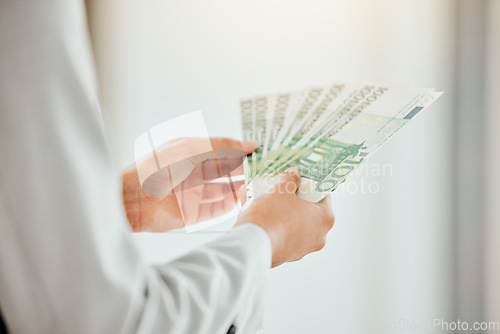 Image of Money, cash or stack of notes for investment, finance and savings hands counting budget or financial growth. Many bills for paying, buying and spending or wise person or entrepreneur holding profit