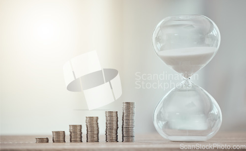 Image of Cash coins for a future investment with hourglass, savings and growth of finance at the bank. Sand clock countdown for opening of the financial economy market. Money for a corporate business budget.