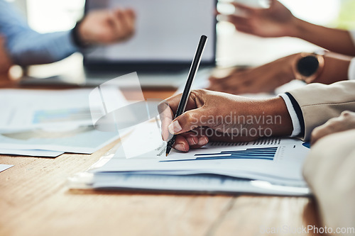 Image of Business analyst hands writing on paperwork, making notes and checking data, charts and graphs in an office boardroom meeting. Closeup of man monitoring company growth, profit and analyzing documents