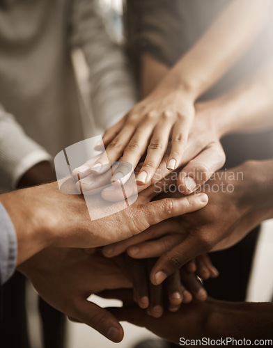 Image of Hands, teamwork and support with a group or team of people showing togetherness, unity and solidarity in a gesture of working together, trust and collaboration. Closeup of cooperation and motivation