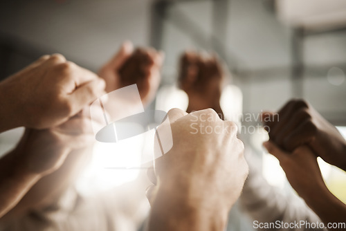 Image of Diverse people hold hands in teamwork, success and support while showing solidarity, trust and unity in office. Closeup of business team, men and women standing together for equal workplace rights