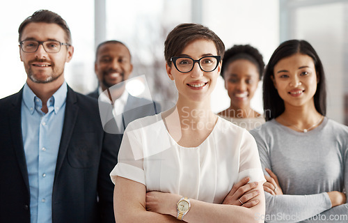 Image of Smiling and modern team of business workers happy about teamwork collaboration and success. Portrait of successful office group ready to work. Colleagues standing together with a sense of community