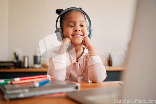 Image of Distance learning, education and online lesson with girl wearing headphones and laptop webcam. Kindergaten or primary school Student studying with virtual video internet class with a teacher at home