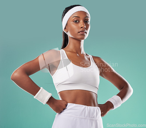 Image of Wellness, fitness and power by a confident athletic woman serious about her health and body goals. Portrait of a gym trainer or coach with an assertive, tough, attitude and healthy lifestyle