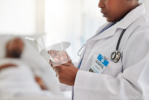 Image of Health, insurance and medicine with a doctor typing on a digital tablet, writing online prescription. Healthcare professional using app on the internet while doing telemedicine in a hospital