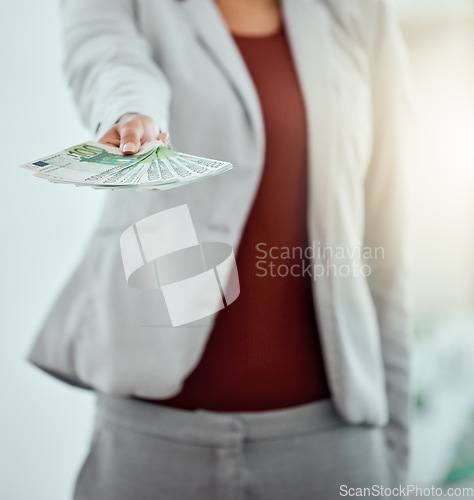 Image of Money, finance and bribe in the hands of a financial advisor, investment broker or wealth manager offering payment. Cash, currency or bills being held by a foreign exchange professional or investor