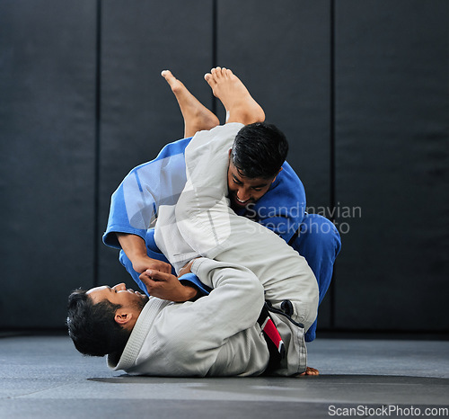 Image of . Men fighting during karate training at fitness studio, doing fight club workout at gym and learning dojo moves as exercise at sports center. Strong, fit and tough people doing physical activity.