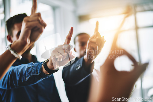 Image of Business people holding up fingers asking a question in an office teamwork meeting. Marketing team waiting and raising hands for collaboration. Smart workers working together in a office