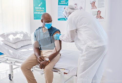 Image of Patient getting covid vaccine, injection and cure from a doctor in a clinic. Man with plaster bandage on arm after flu jab, antiviral shot and health treatment to boost immunity and prevent illness