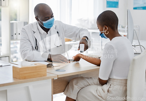 Image of Doctor doing covid wrist temperature test on patient with face mask while consulting in appointment checkup, hospital office or clinic. Woman with healthcare insurance at a covid 19 medical facility