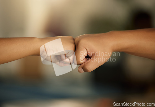 Image of Power, teamwork and solidarity fist bump gesture of people showing support, success or achieving goal. Celebrating, winning hands doing greeting as motivation, unity or team effort emoji