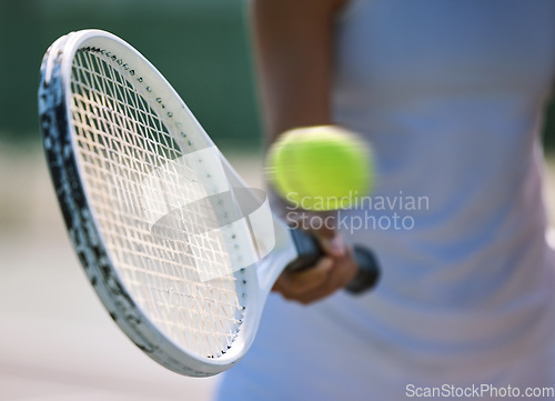 Image of Closeup tennis ball, racket and sport for fit, active and healthy player hitting, training and exercising for practice. Professional player warming up for routine workout and exercise match on court