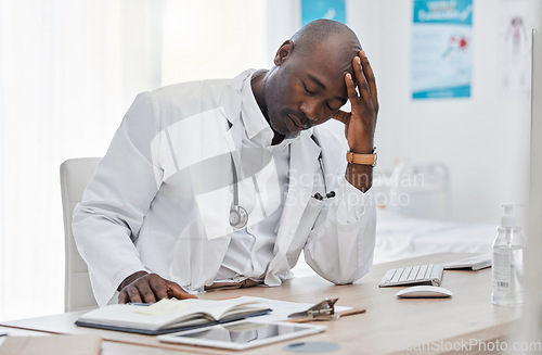 Image of Stress, anxiety and sad doctor, medical professional and healthcare worker with negative test results on technology. Thinking gp with burnout headache or bad news in clinic, hospital or health center