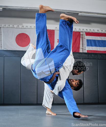 Image of Health, fitness and motivation, men in karate fight for a winner in a dojo. Martial arts, a learning exercise to overcome, fight failure and beat the competition. Sports students in a battle to win.