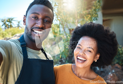 Image of Trendy couple taking selfie outdoors in summer for memories or for sharing on social media. Small business owner or sommelier taking photo with happy customer service influencer or vlogger